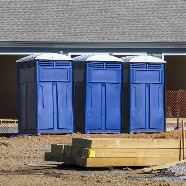 what is the cost difference between standard and deluxe portable toilet rentals in Lattimer